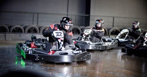 A group of friends racing Go-Karts